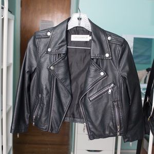 Cropped faux leather jacket.